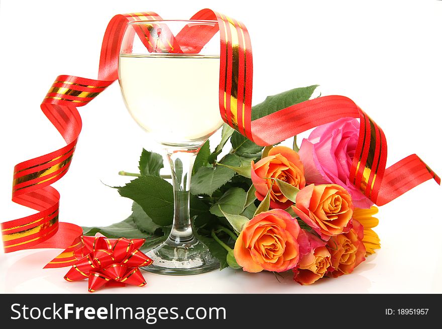 Wine and flowers on a white background
