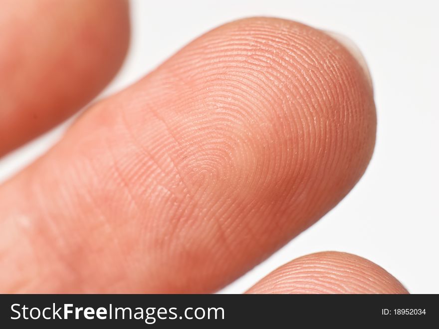 Macro photo of a men finger. White background. Macro photo of a men finger. White background