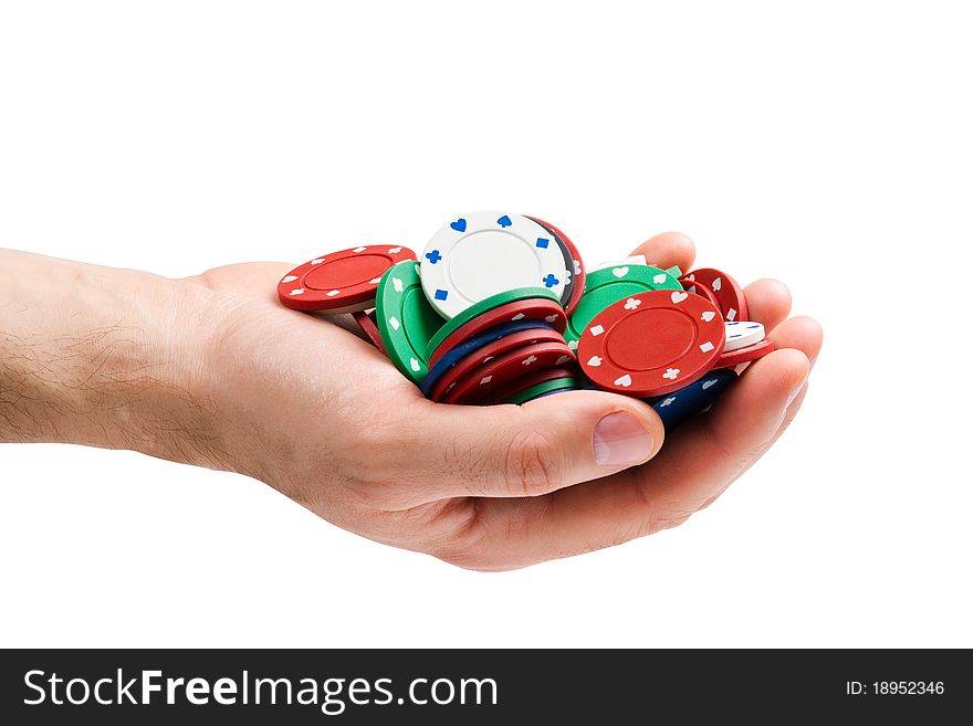 Hand with poker chips, isolated on white