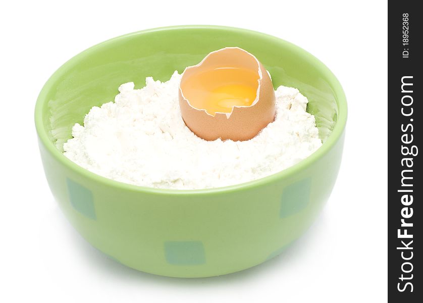 Egg picture in a flour on a white background. Egg picture in a flour on a white background