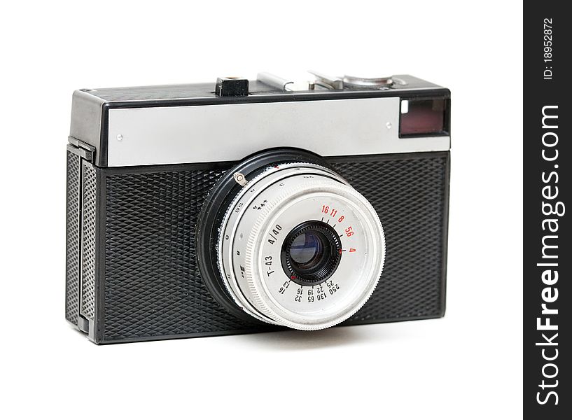 Old camera with the lens isolated on a white background