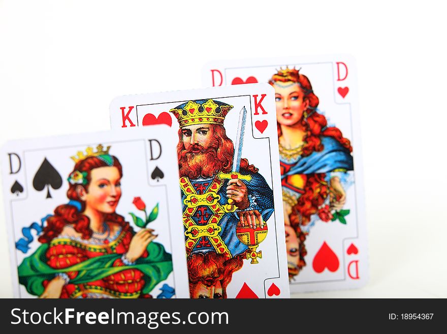 Three playing cards love triangle on white background. Three playing cards love triangle on white background