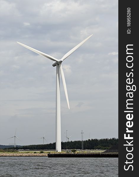 Wind generator on a river coast, Denmark