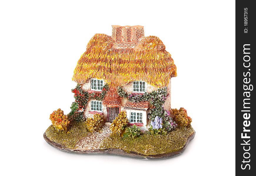 Toy country house on white background. Isolated.