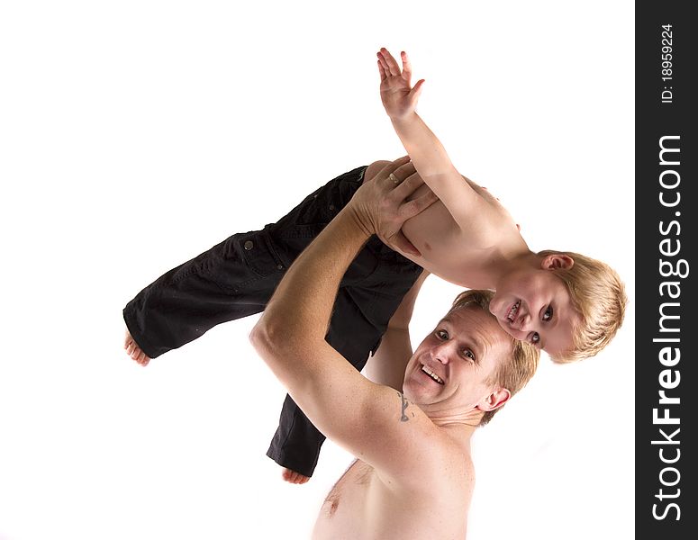 Father and son playing airplane isolated on a white background. Father and son playing airplane isolated on a white background