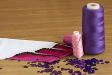 Spools Thread And Fabric With Embroidery Royalty Free Stock Photo Spools Thread And Fabric With Embroidery Royalty Free Stock Photo