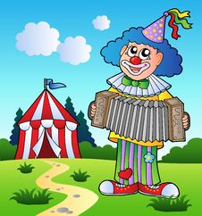 Clown Playing Accordion Near Tent Stock Photo Clown Playing Accordion Near Tent Stock Photo