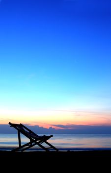 One Deckchairs On Beach At Sunset Royalty Free Stock Images One Deckchairs On Beach At Sunset Royalty Free Stock Images