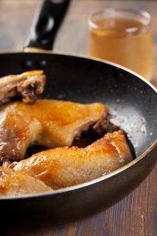 Chicken Legs Fried In A Non Stick Pan Stock Image