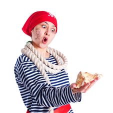 Girl Dressed As A Pirate With A Seashell Stock Photo