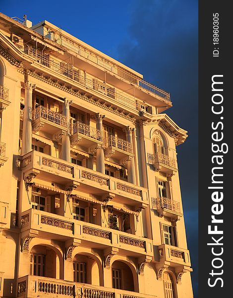 Traditional neo-classical building in the seaside of Thessaloniki. The light is natural by the sunset.