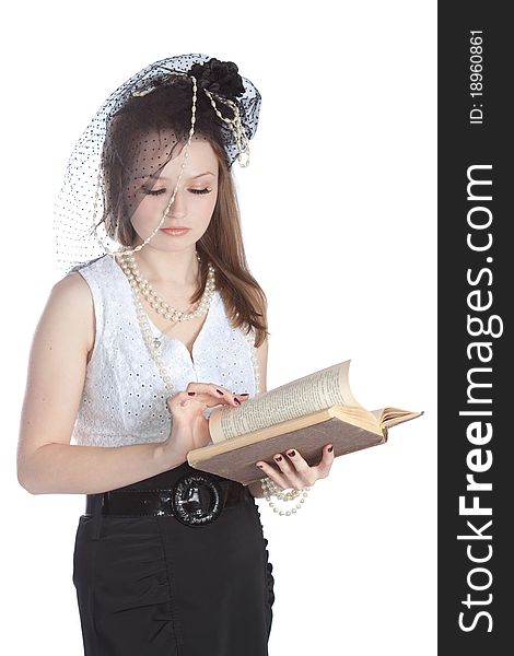 Vintage portrait young woman in a hat and a book. Vintage portrait young woman in a hat and a book.