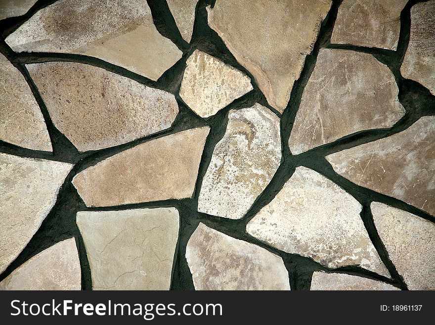 Wall lined with large flat stone. Wall lined with large flat stone