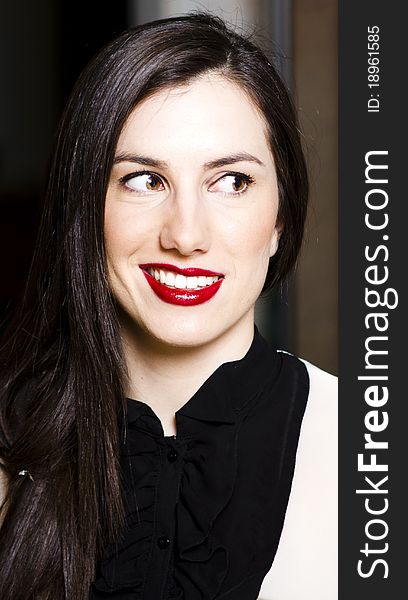 Young brunette woman portrait studio shot red lipstick. Young brunette woman portrait studio shot red lipstick