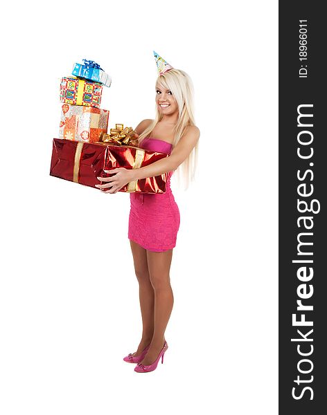 Young beautiful woman carrying stack of festive birthday gifts over white background