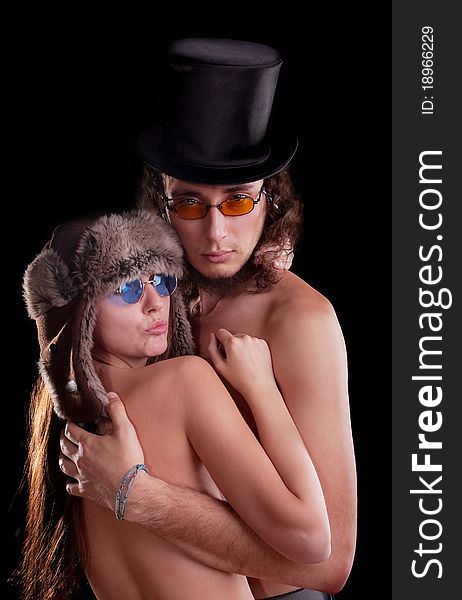 young couple. Posing in a studio. young couple. Posing in a studio