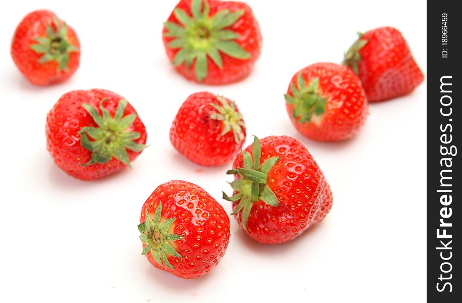 Ripe berries on a white background