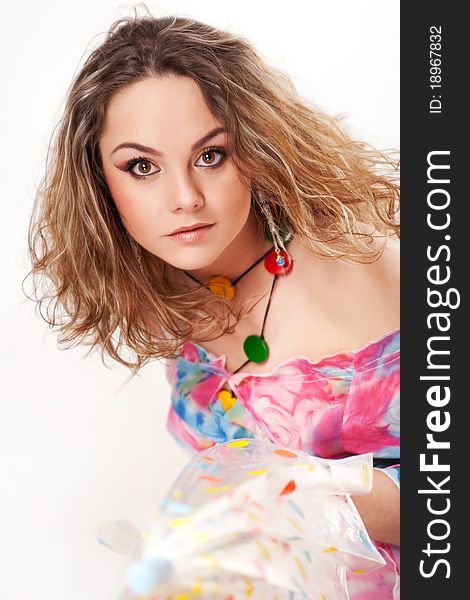 Young woman posing with a closed umbrella. Young woman posing with a closed umbrella