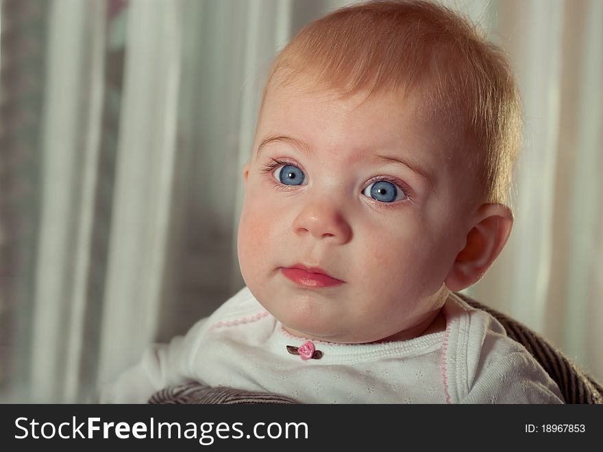 Closeup portrait of cute baby girl