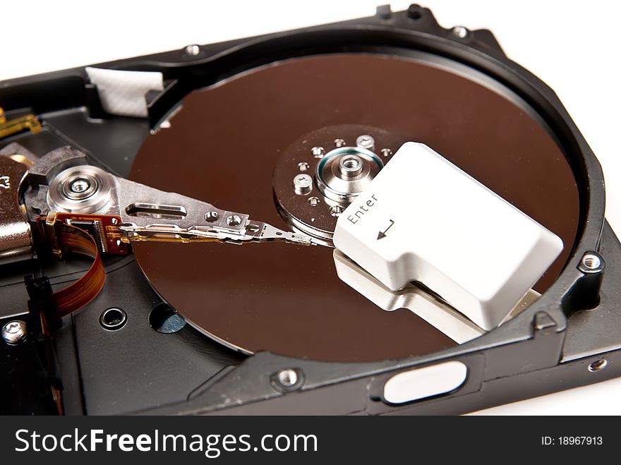 Hard disk with enter key. On white background. Hard disk with enter key. On white background