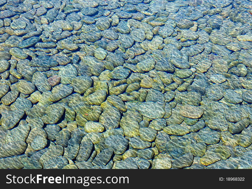 Smooth Colorful Stones under Water