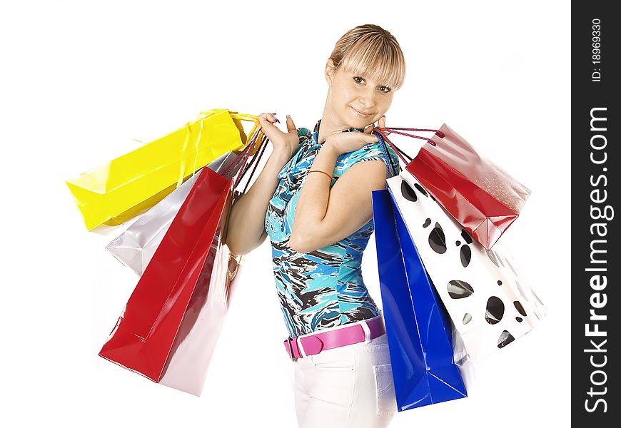 Portrait young adult girl with colored bags. Portrait young adult girl with colored bags