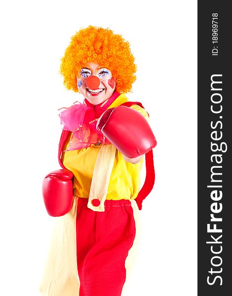 A girl dressed as a clown with red nose