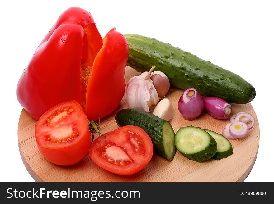 Ingredients for a vegetable salad on a cutting board