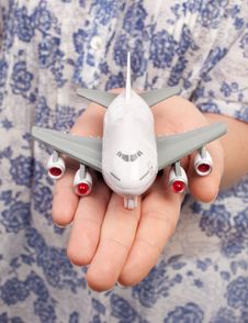 Woman Hand With A Small Plane Stock Photos Woman Hand With A Small Plane Stock Photos