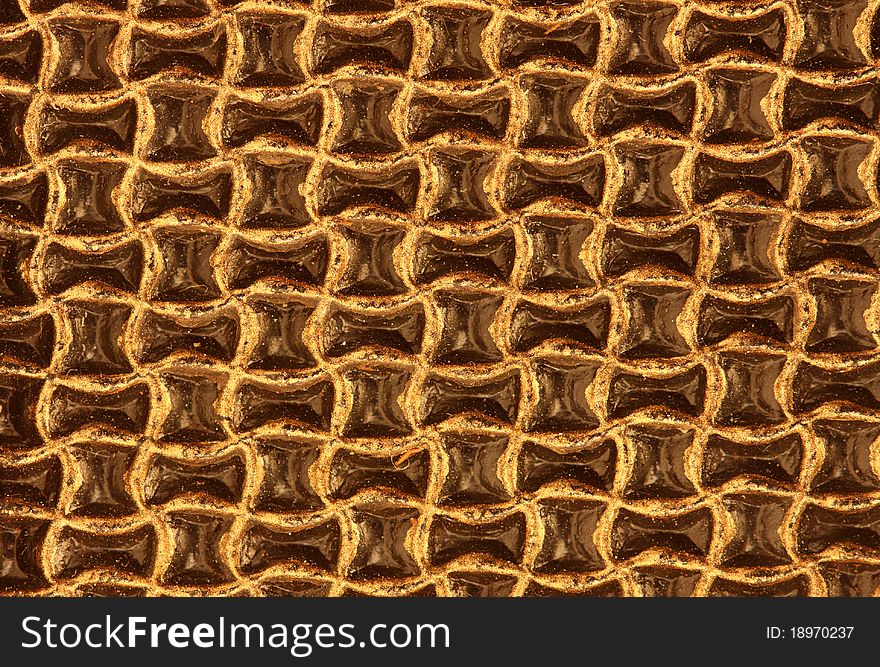 Yellow metal background close up
