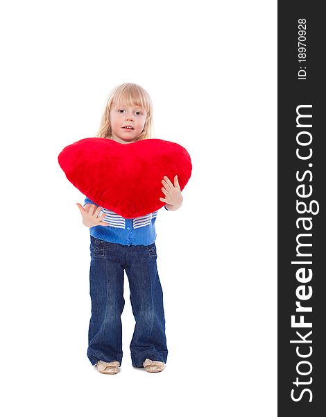 Little girl with red heart at hands, isolated