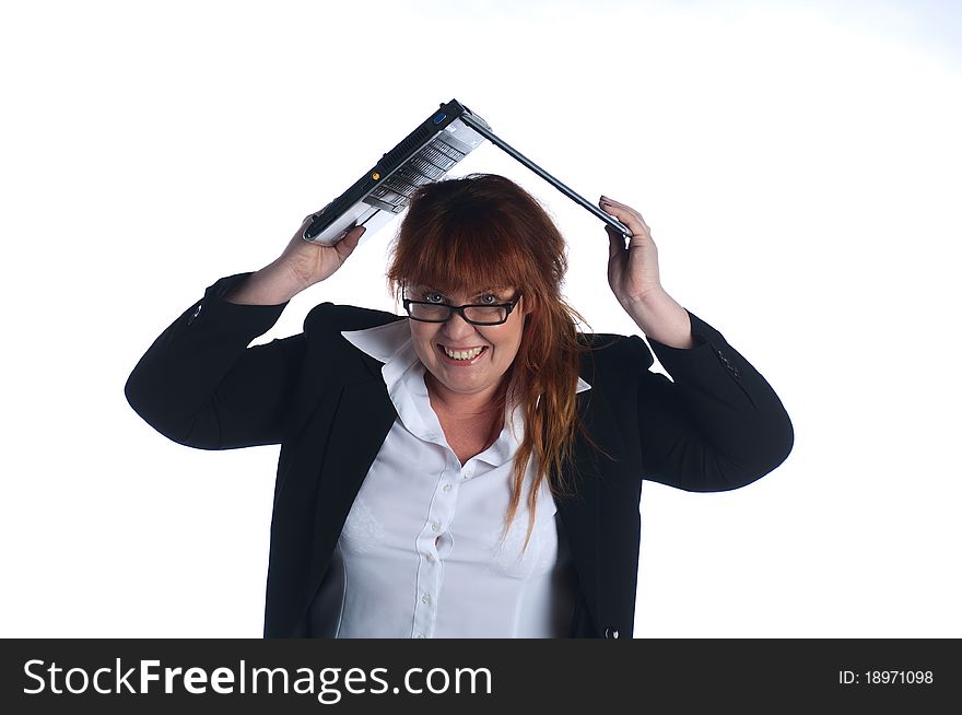 The businesswoman works at the computer at office