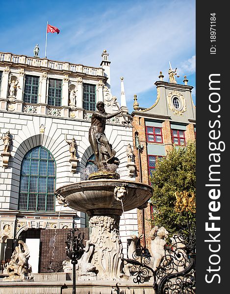 Neptune's Fountain in the center of the Long Market in Gdansk, Poland. Neptune's Fountain in the center of the Long Market in Gdansk, Poland