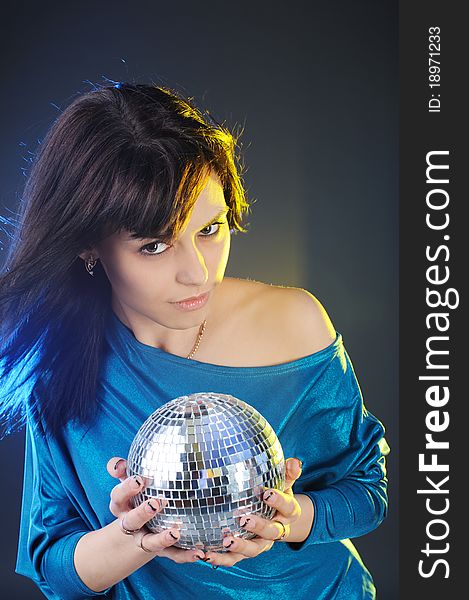 Portrait of young beautiful woman with disco ball. Portrait of young beautiful woman with disco ball