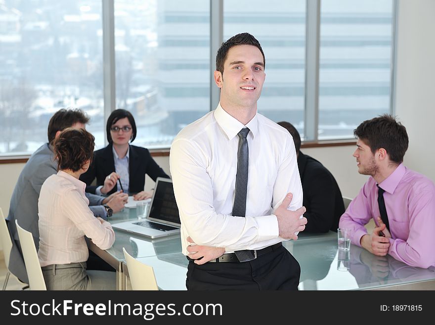 Group Of Business People At Meeting