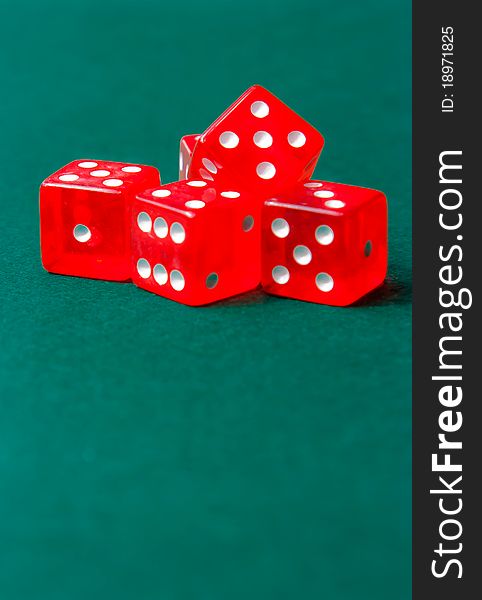 Poker dice on playmat