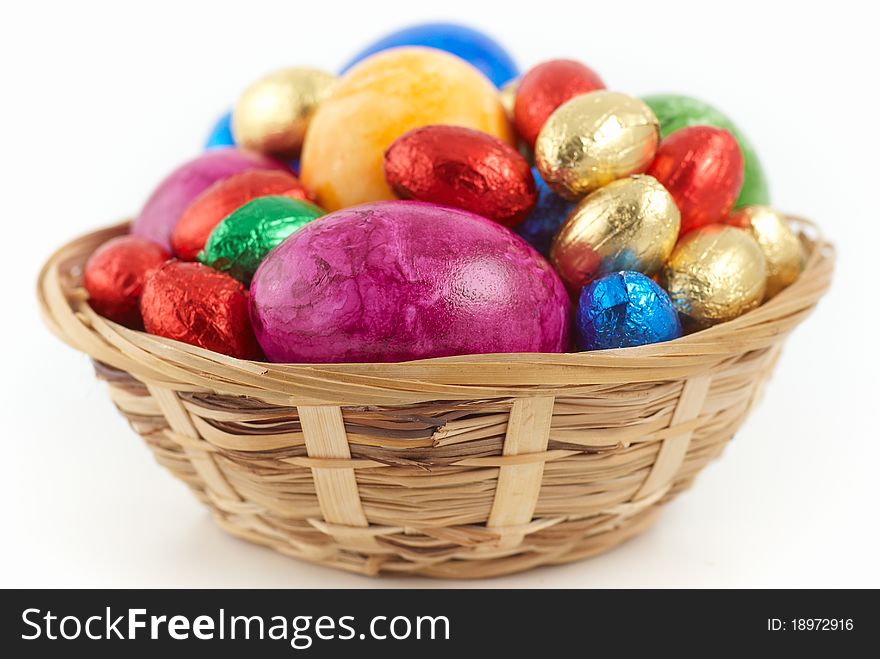 Easter nest with eggs an chocolate