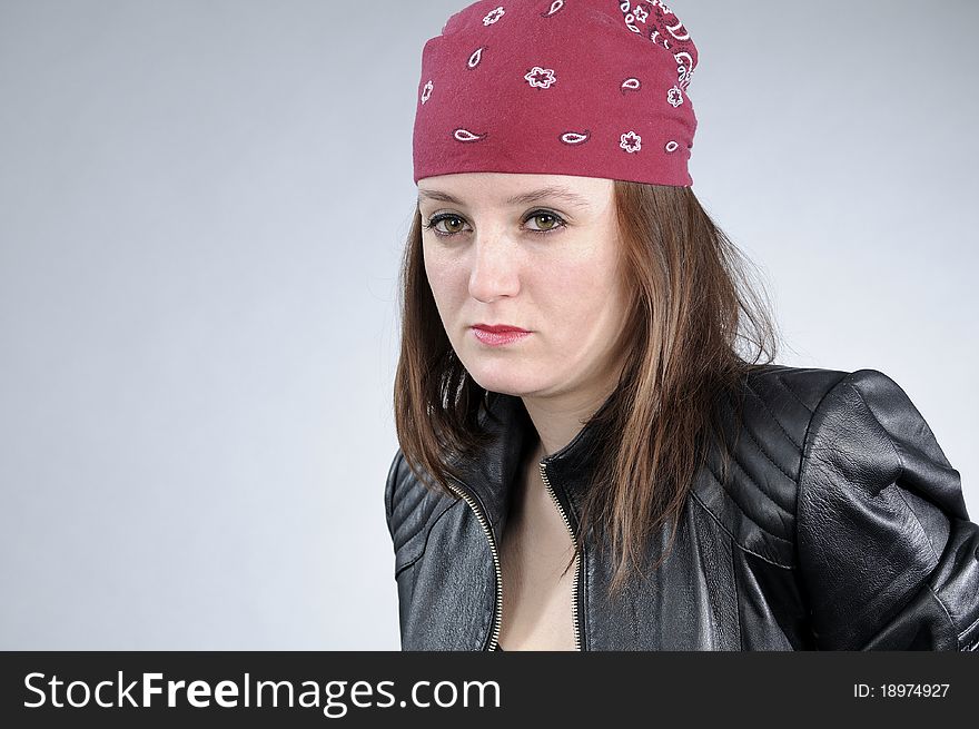 Young white girl posing with black jacket and accessories. Young white girl posing with black jacket and accessories