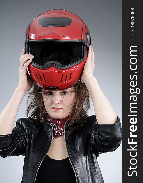 Woman arranging helmet
