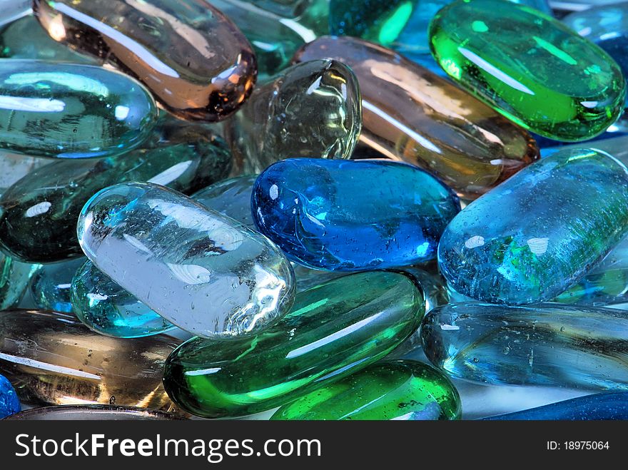 Closeup of clear glass decorative nuggets. Closeup of clear glass decorative nuggets