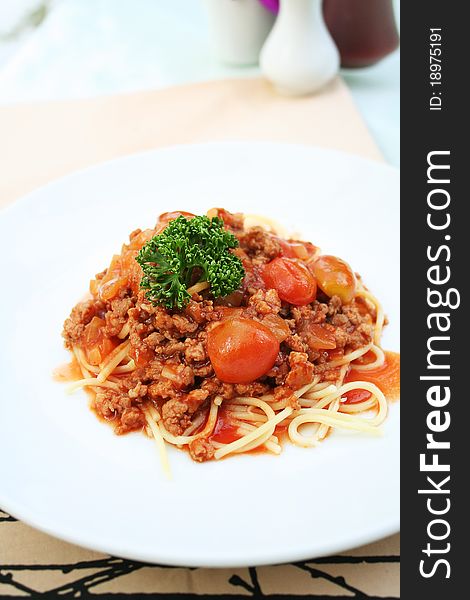 Plate of spaghetti with tomato sauce