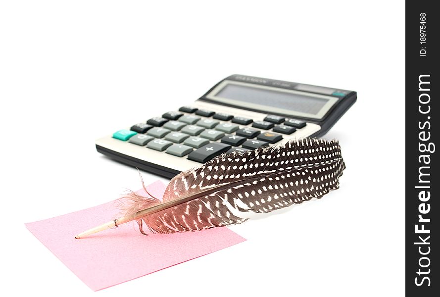 It notes and a calculator on a white background