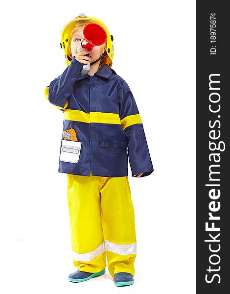 Little boy in fireman costume with megaphone isolated on white background Add to Lightbox