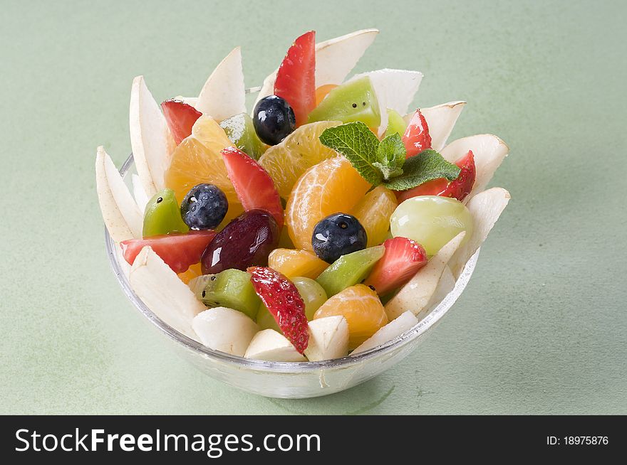 Fresh fruits salad with mint- healthy eating. Fresh fruits salad with mint- healthy eating