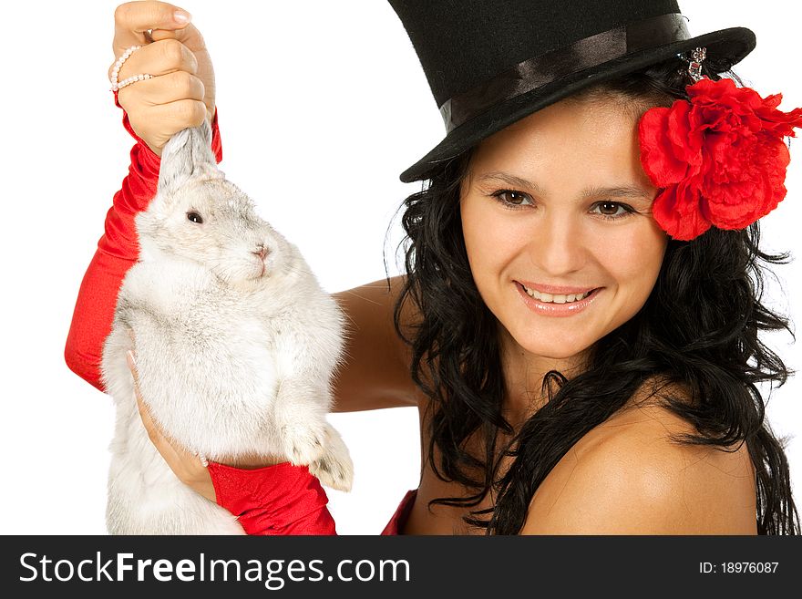 Closeup portrait of a cute magician with bunny against white background. Closeup portrait of a cute magician with bunny against white background