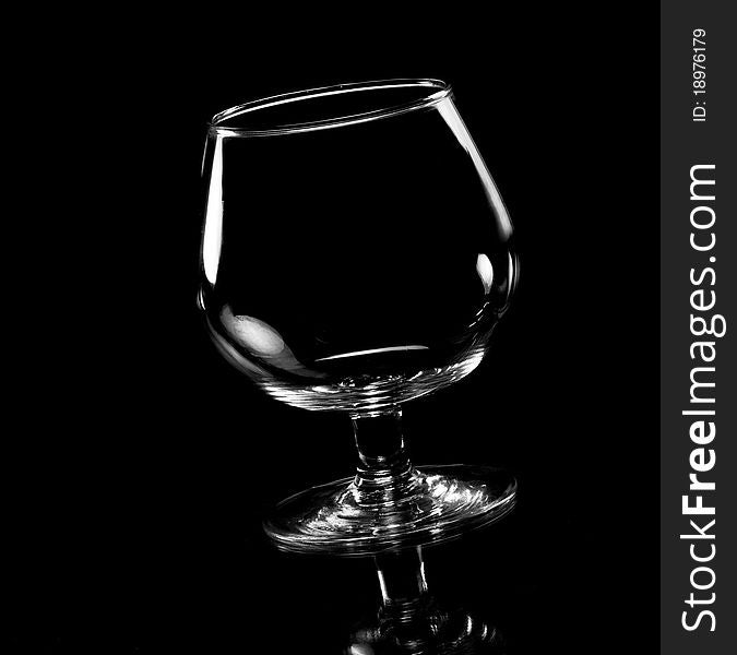 Empty glass in the dark