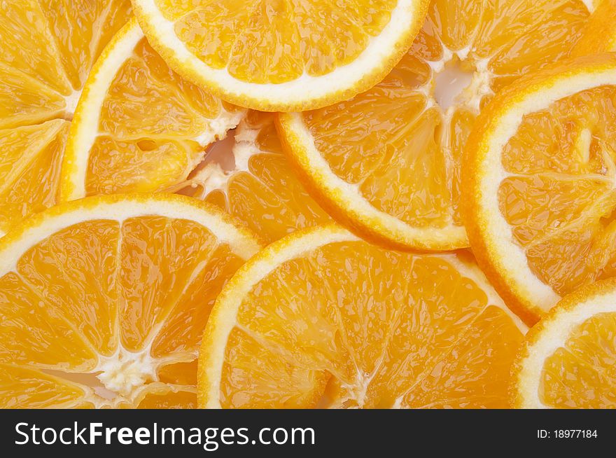 Plenty of fresh oranges on the background. Plenty of fresh oranges on the background