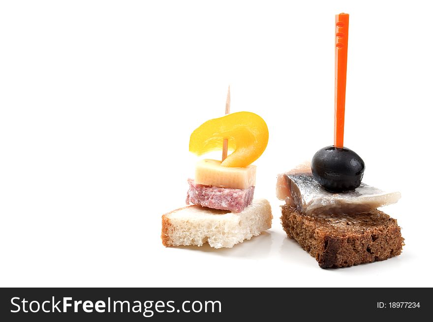 Bread with olive and salami isolated on a white background