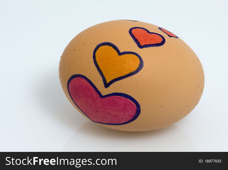 Egg with some hearts drawn. Egg with some hearts drawn