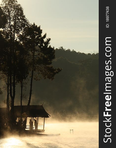 A hut in the morning fog in northern Thailand